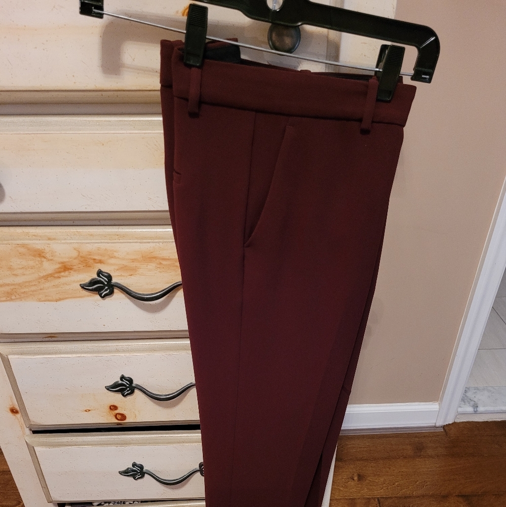Theory tapered leg trouser size 10 in a wine colored tone.